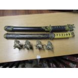 2 Samurai swords with wall mounts. Swords L49cm approx