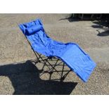 Fold out sun lounger in bag