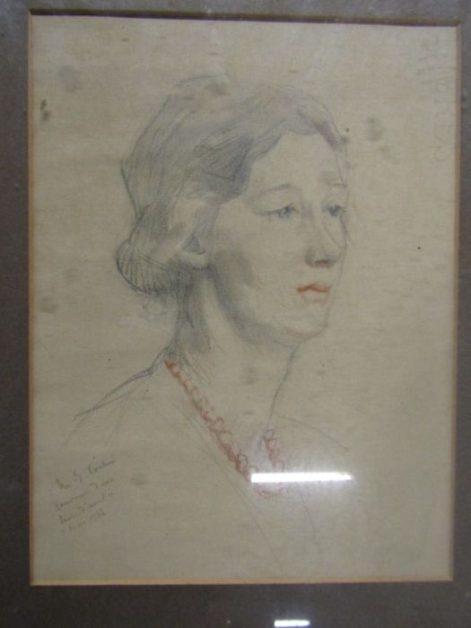 A pencil portrait, signed