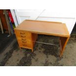 Mid century oak school teachers desk with 5 drawers to one side and brown vinyl top H73cm W122cm