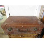A large vintage leather suitcase with 'E.P.D' stamped on the top 28x17.9.5"