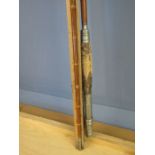 A vintage split can fishing rod with canvas bag