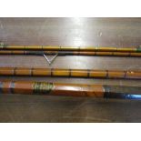 A vintage split cane fishing rod