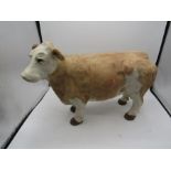 A signed Julia Hulme pottery Simmental cow 16x11"