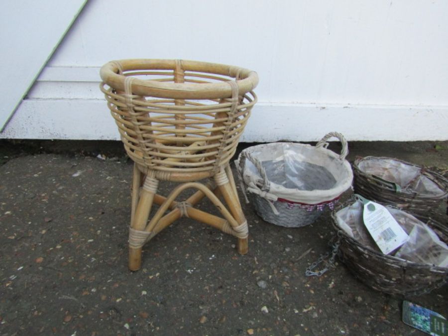 Wicker garden planter and hanging baskets