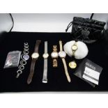 A collection of watches to include Guess, Quartz, Sekonda, Adec, Seksy, Michael Kors