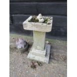 Concrete garden planter on stand and dog ornament . Planter H55cm approx