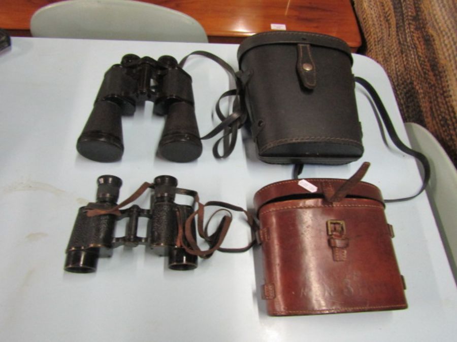 2 Pairs of binoculars in cases