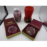 A red mottled vase, purple vase and 2 Wedgwood paperweights