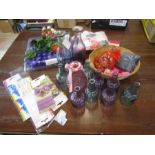 A box of bottle vases, gift bags, fake flowers, ribbons etc