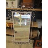 A white wrought iron mirror