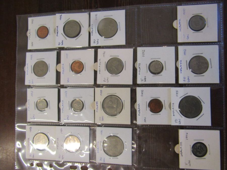 A collection of 50% English and 50% foreign coinage- English copper with some modern crowns and - Image 13 of 23