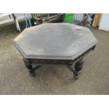 Gothic oak carved Hexagonal table on castors H82cm Top151cm approx