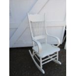 A white rocking chair