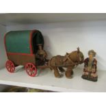 A felt and leather horse & wagon with 2 dolls