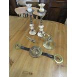 Brass bell, pair of candle sticks and crocodile nut crackers etc