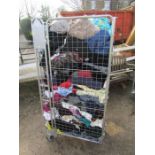 Stillage containing textiles including clothes and handbags etc
