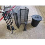 Cast iron companion set, candle stick, ash bucket and fire guard