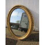 Gilded oval wall mirror 54cm x 65cm approx