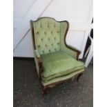 A vintage wing back chair
