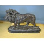 A resin lion statue 17"x 11