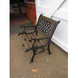 Painted cast iron garden chair with wooden slats