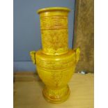 A yellow Oriental vase