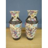 A pair of Oriental crackle vases 21cm tall