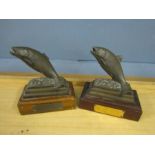 A pair of trout angling trophys one finn is broken, stamped