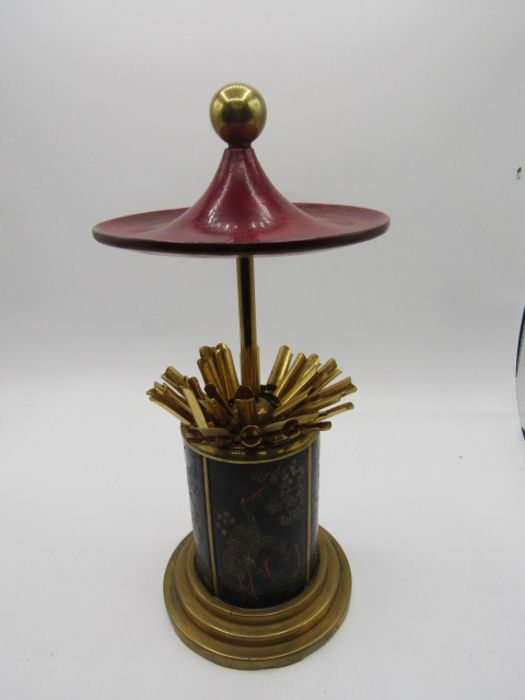 Vintage pop up rotating cigarette dispenser, brass with Oriental design