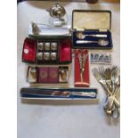 Collection of silver plate and other meta items to include napkin rings, cheese markers, candle