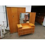 Retro bedroom furniture suite including wardrobes and dressing table with mirror