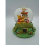 Disney store Winnie the Pooh musical snow globe
