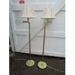 Pair of adjustable brass floor lamps