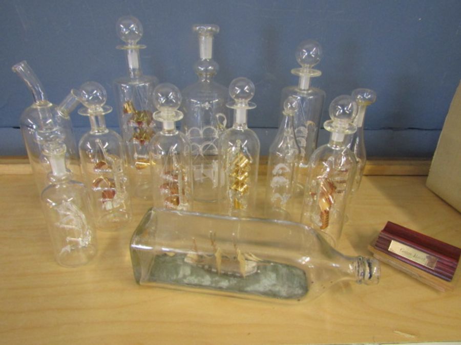A collection of ships in bottles