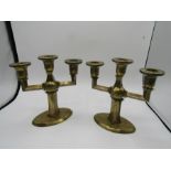 A pair of 1895 aesthetic movement brass candlesticks 7.5" high