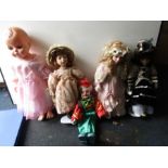 A collection of dolls and clown