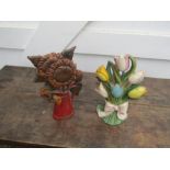 2 Painted cast iron flower doorstops