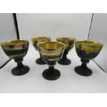 5 pottery goblets with lustre gold glaze inside