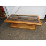 Oak glass topped coffee table with brass detail H38cm Top 66cm x 137cm approx