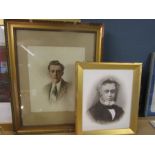 2 framed portrait prints