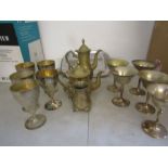 Brass teapots and plated goblets