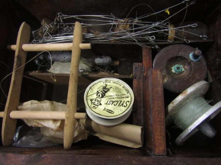 Olympic spinning reel, tackle box with contents a box of vintage reels, weights etc - Image 3 of 5