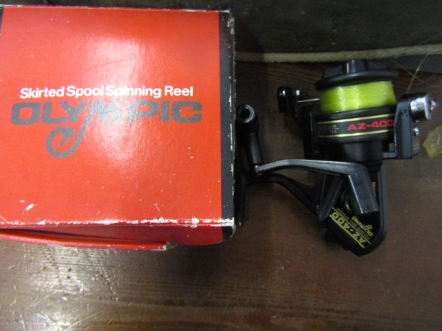 Olympic spinning reel, tackle box with contents a box of vintage reels, weights etc - Image 2 of 5