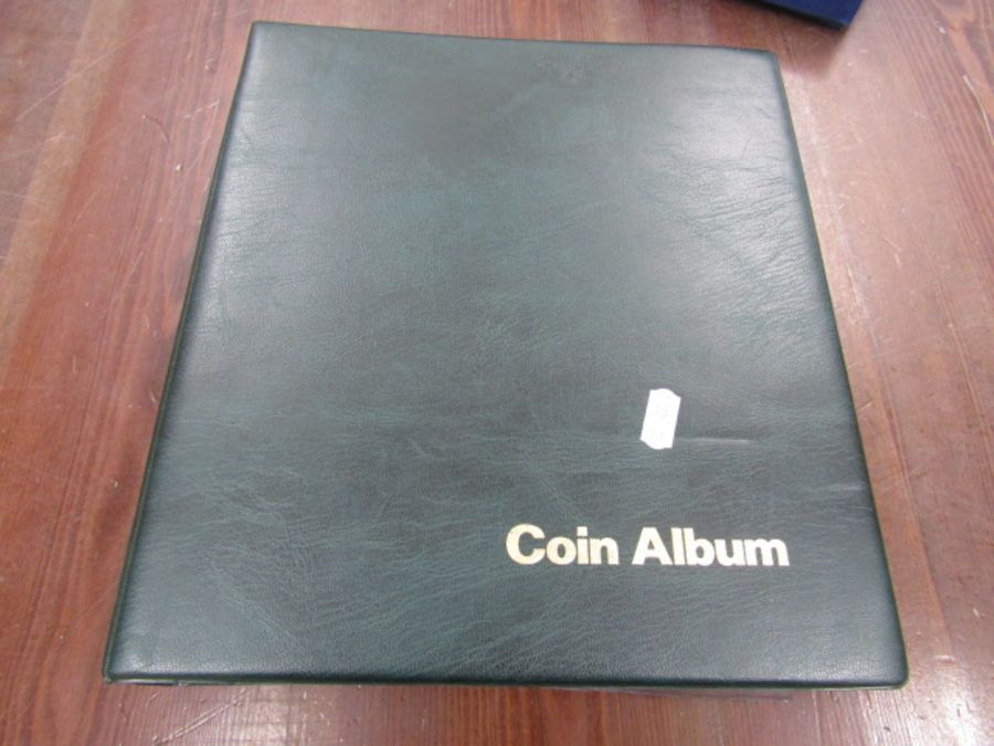 A large collection of coins in album- only few pages photographed- more to add