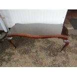 Mahogany coffee table with glass top H47cm Top 52cm x 123cm approx