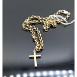 9ct gold crucifix pendant on a heavy belcher link yellow metal chain stamped 375, gross weight