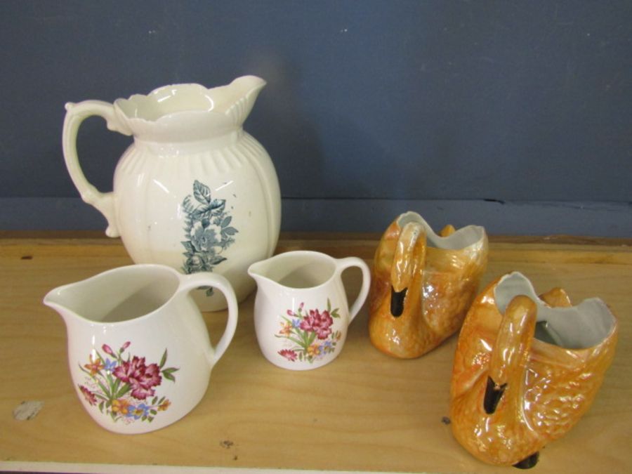 Jugs and swan planters