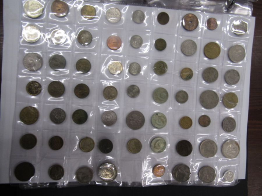 A large collection of coins in album- only few pages photographed- more to add - Image 9 of 11