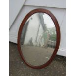 Oval mahogany inlaid wall mirror 54cm x 80cm approx